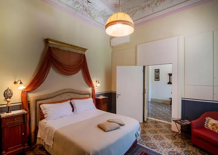 Palazzo Rollo לינה וארוחת בוקר לצ'ה